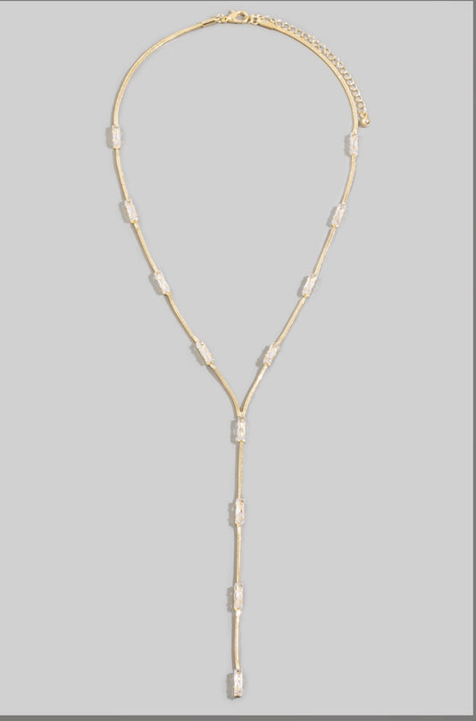 Gold-tone baguette cubic zirconia Y necklace featuring a sleek snake chain and elegant lariat drop, perfect for bridal, evening, and special occasion styling.