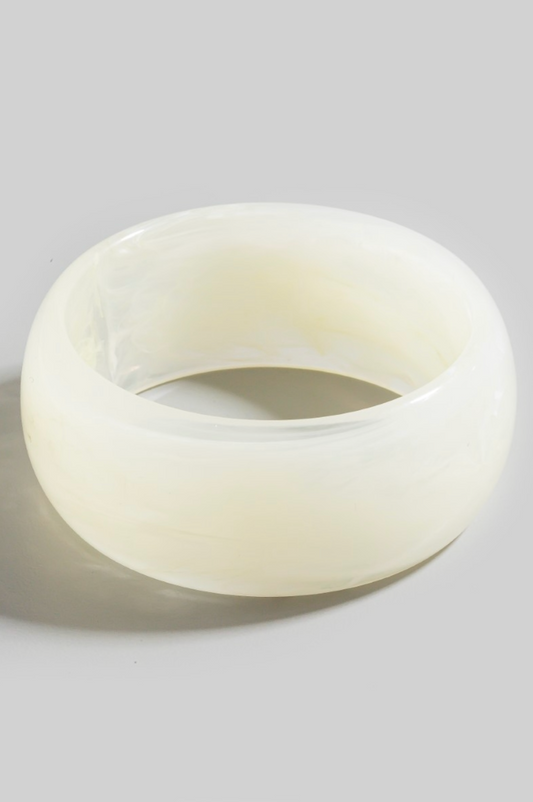 Thick cream marble resin bangle bracelet with glossy sculptural design