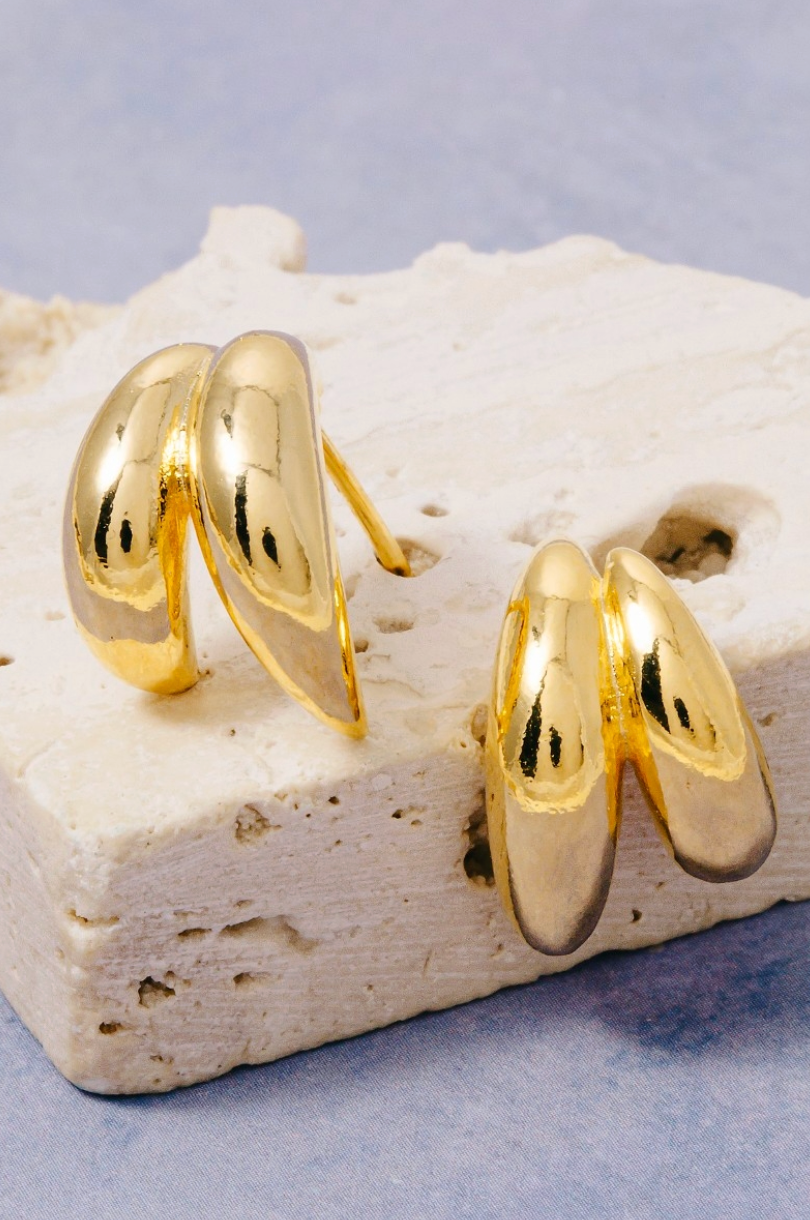 Gold double-line mini hoop earrings with polished brass finish