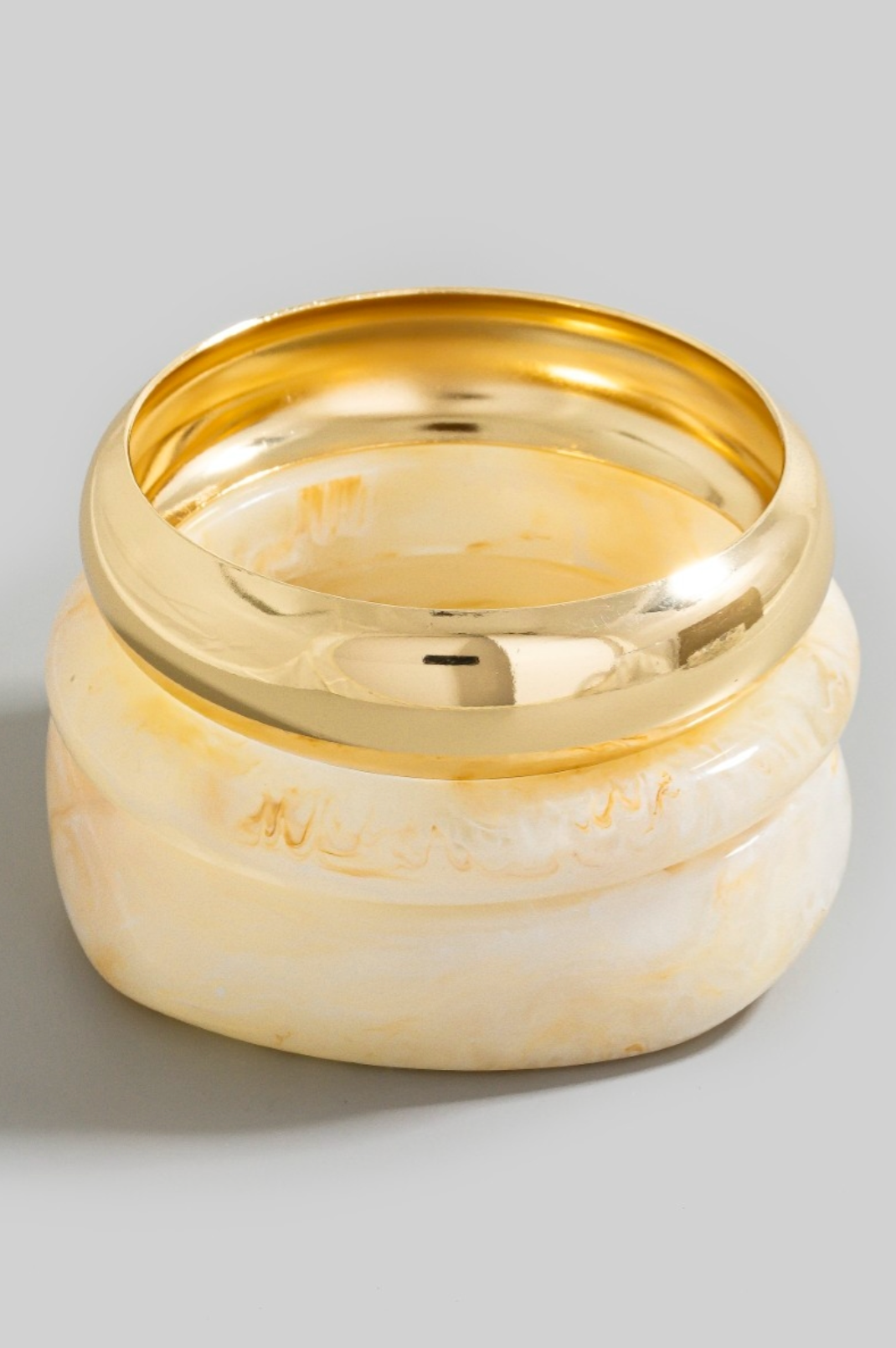 Arden Marble Bangle Set in ivory marbled resin and gold metallic tone