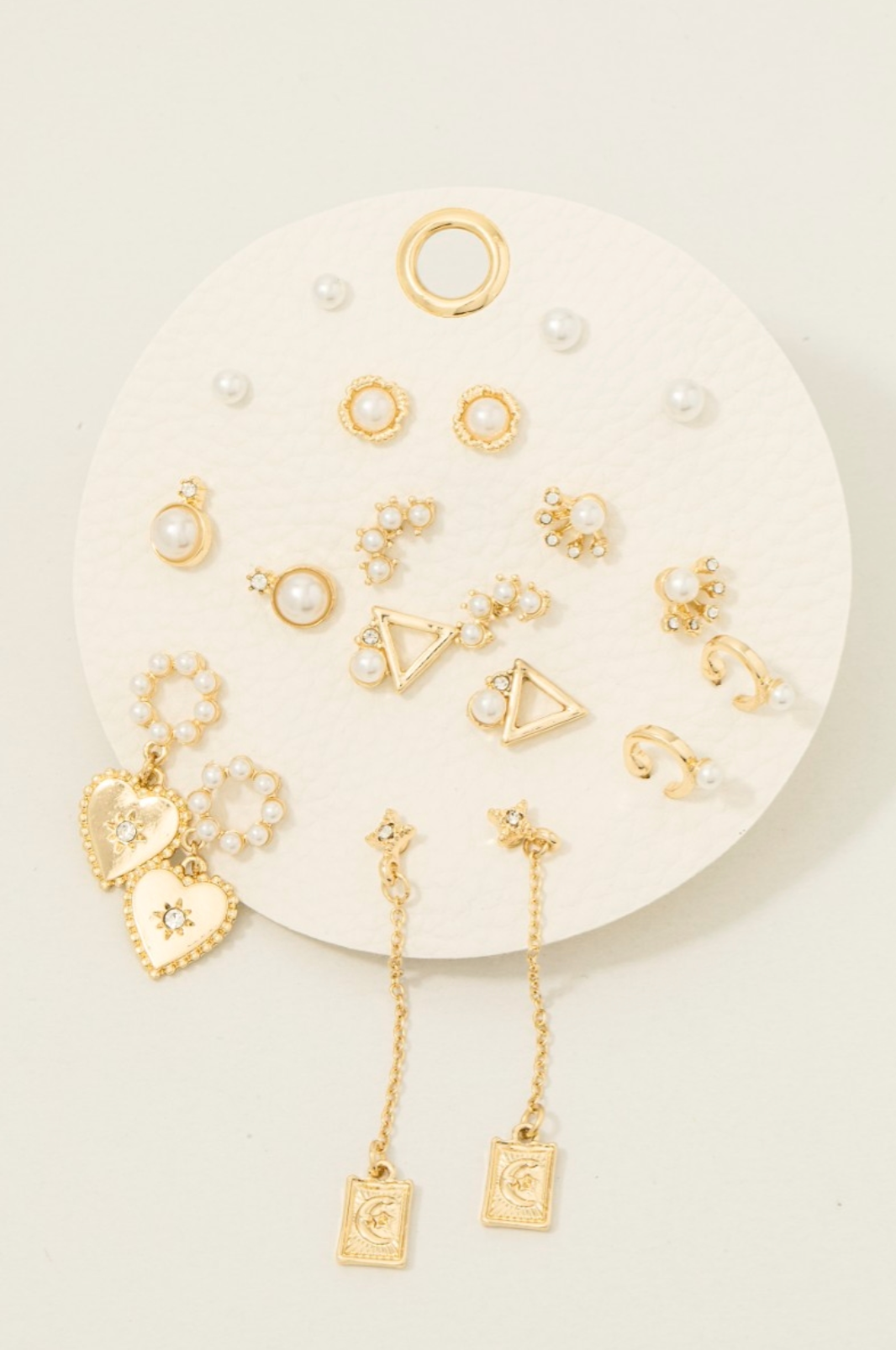 Gold and pearl 10-pair assorted earrings set with heart and geometric designs