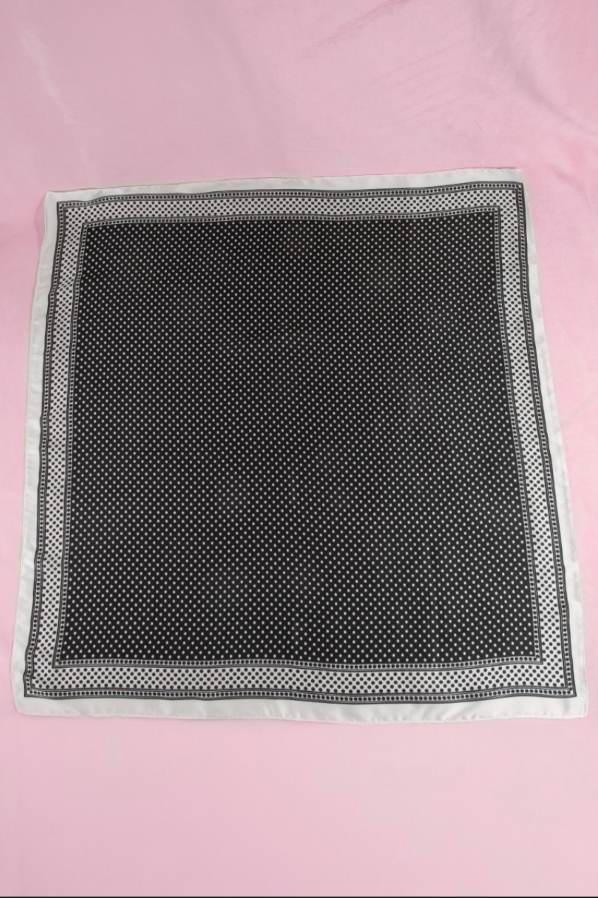 Black satin square scarf featuring a micro white polka dot print with a coordinating ivory border
