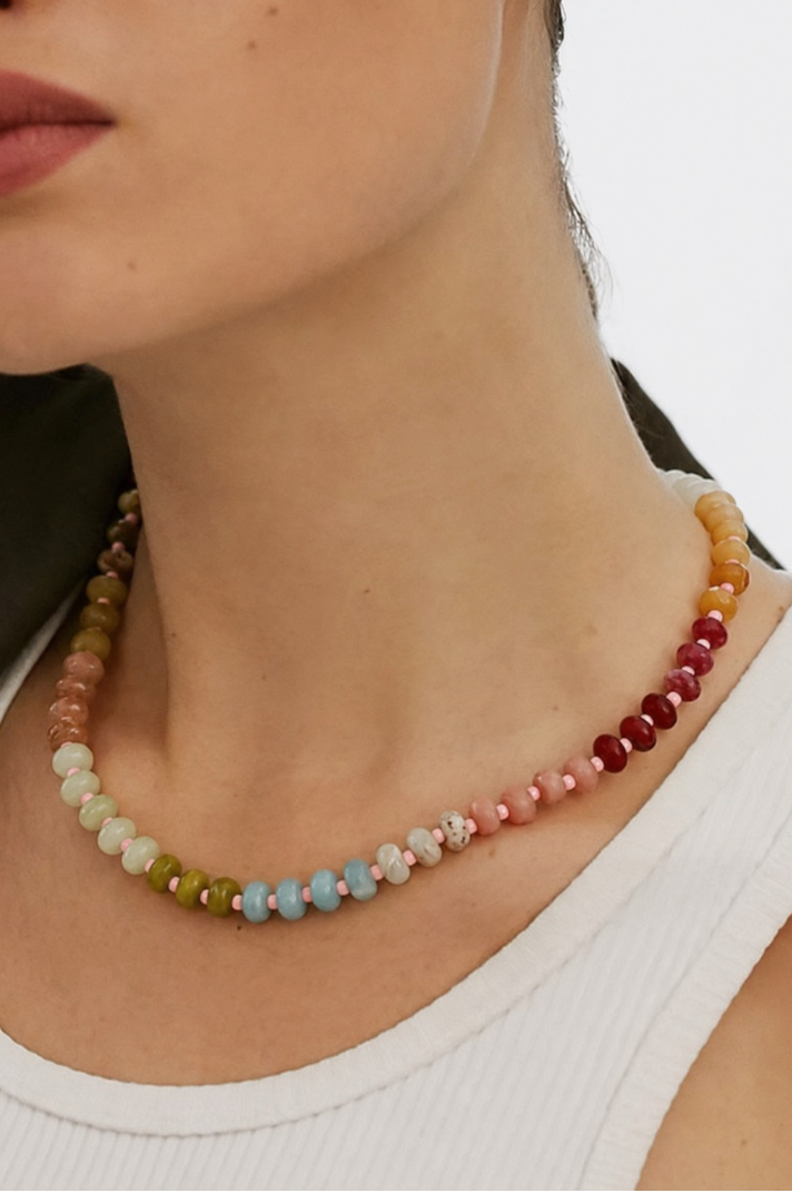 Mixed natural stone and glass bead necklace with soft earthy multicolor beads and adjustable gold lobster clasp.