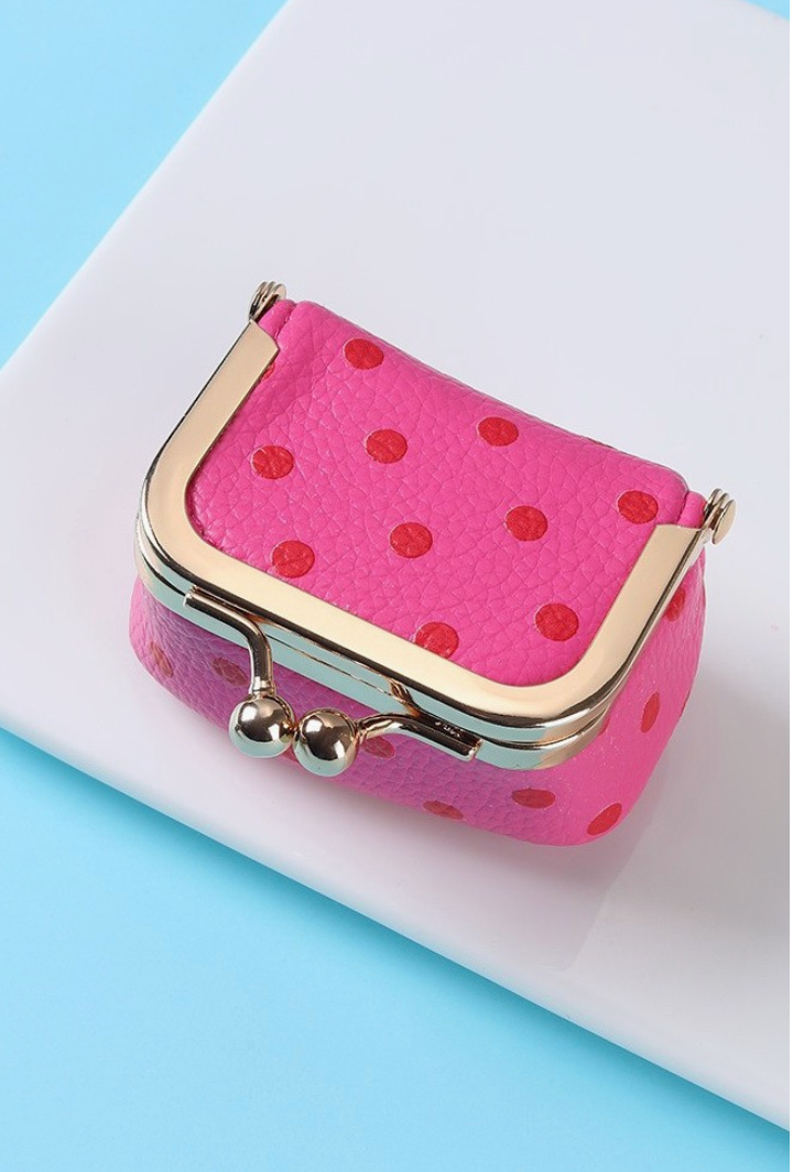 Missing Piece Travel Jewelry Box Fuchsia with red polka dots, textured faux leather exterior and gold-tone kiss-lock closure.