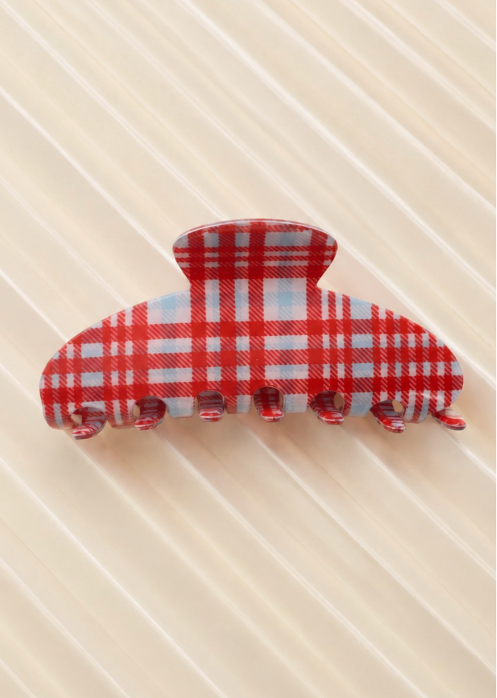 Kelsey Plaid Claw Clip Red featuring a rounded red plaid hair claw with interlocking teeth.