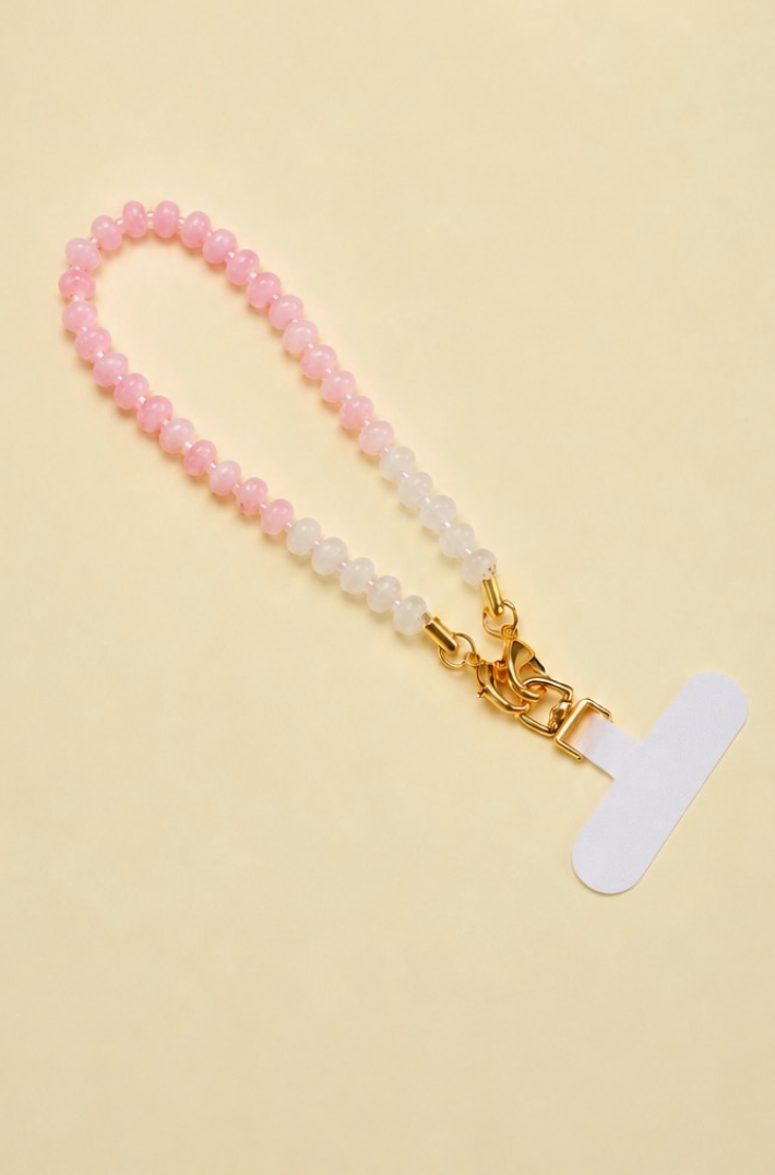 Getaway Car Phone Chain Pink 12-inch beaded phone wrist strap with soft pink and white ombré beads and gold-tone hardware