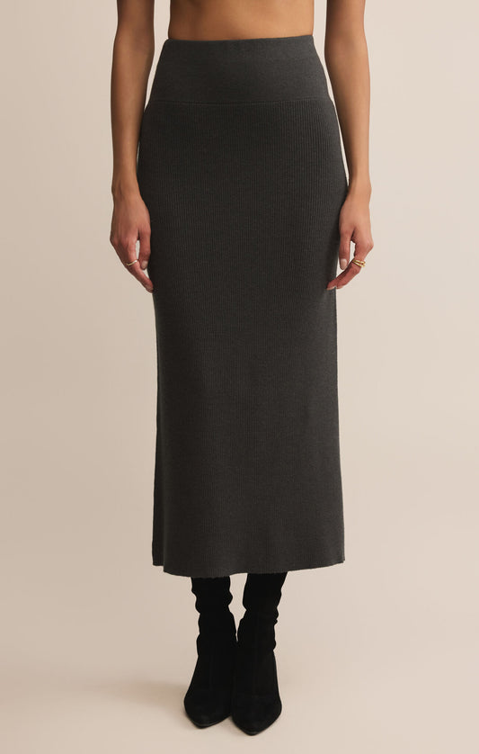 woman wearing charcoal ribbed knit maxi sweater skirt with black boots