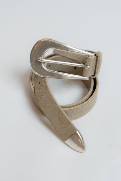 Beige belt with silver buckle on a light gray background