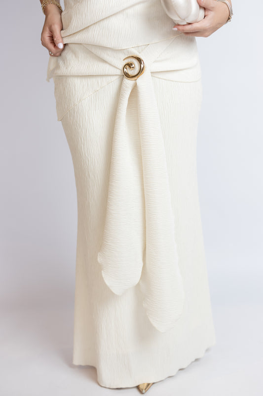 White skirt with a gold belt on a white background