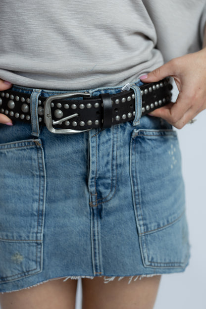 Free People Sola Stud Belt in Black featuring genuine leather construction and rounded stud embellishments throughout.