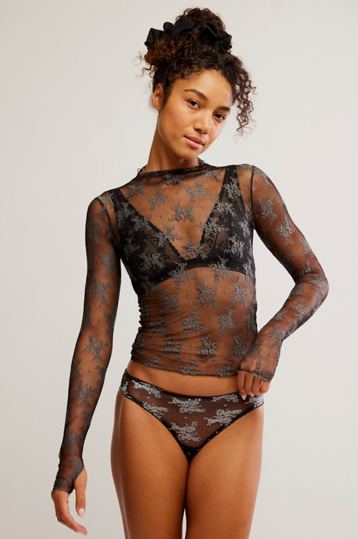 Sheer two-tone mesh embroidered long sleeve layering top with mock neckline and thumbhole sleeves