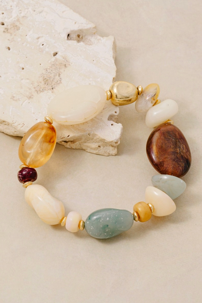 mixed marble resin beaded bracelet with gold accents in neutral earth tones