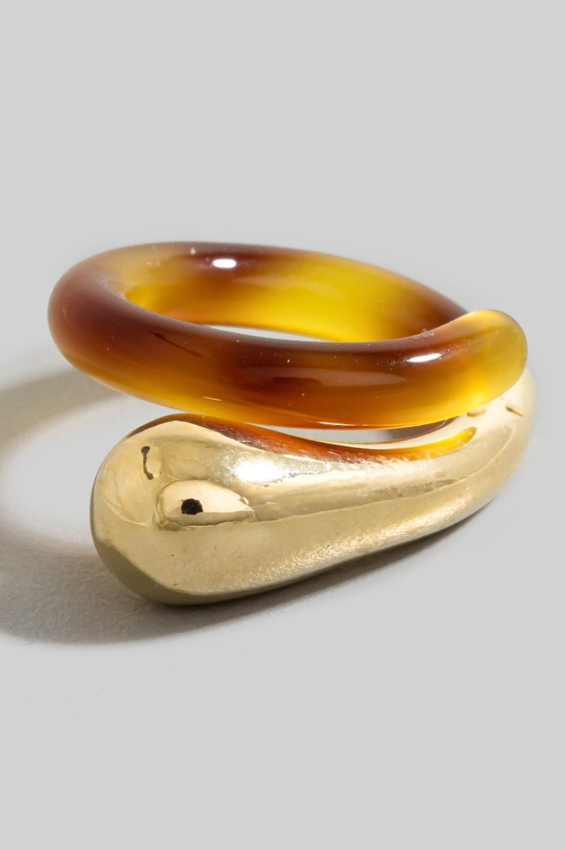 gold and acrylic open band statement ring with wrap design