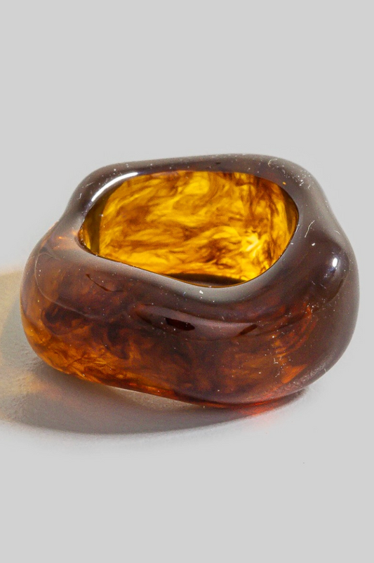 amber-toned warped acrylic statement ring