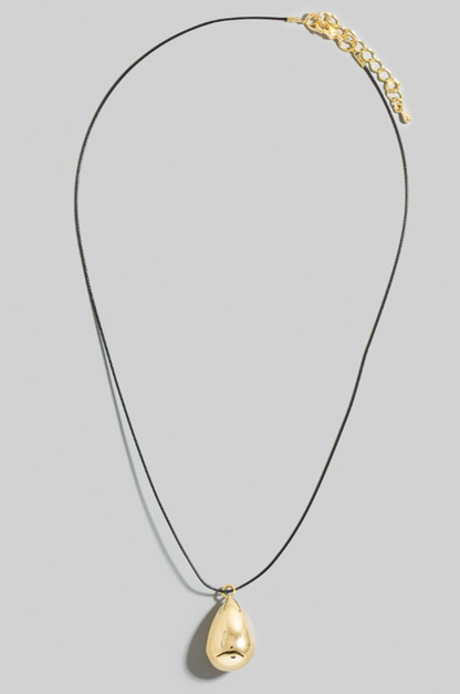 Gold teardrop pendant necklace on black cord