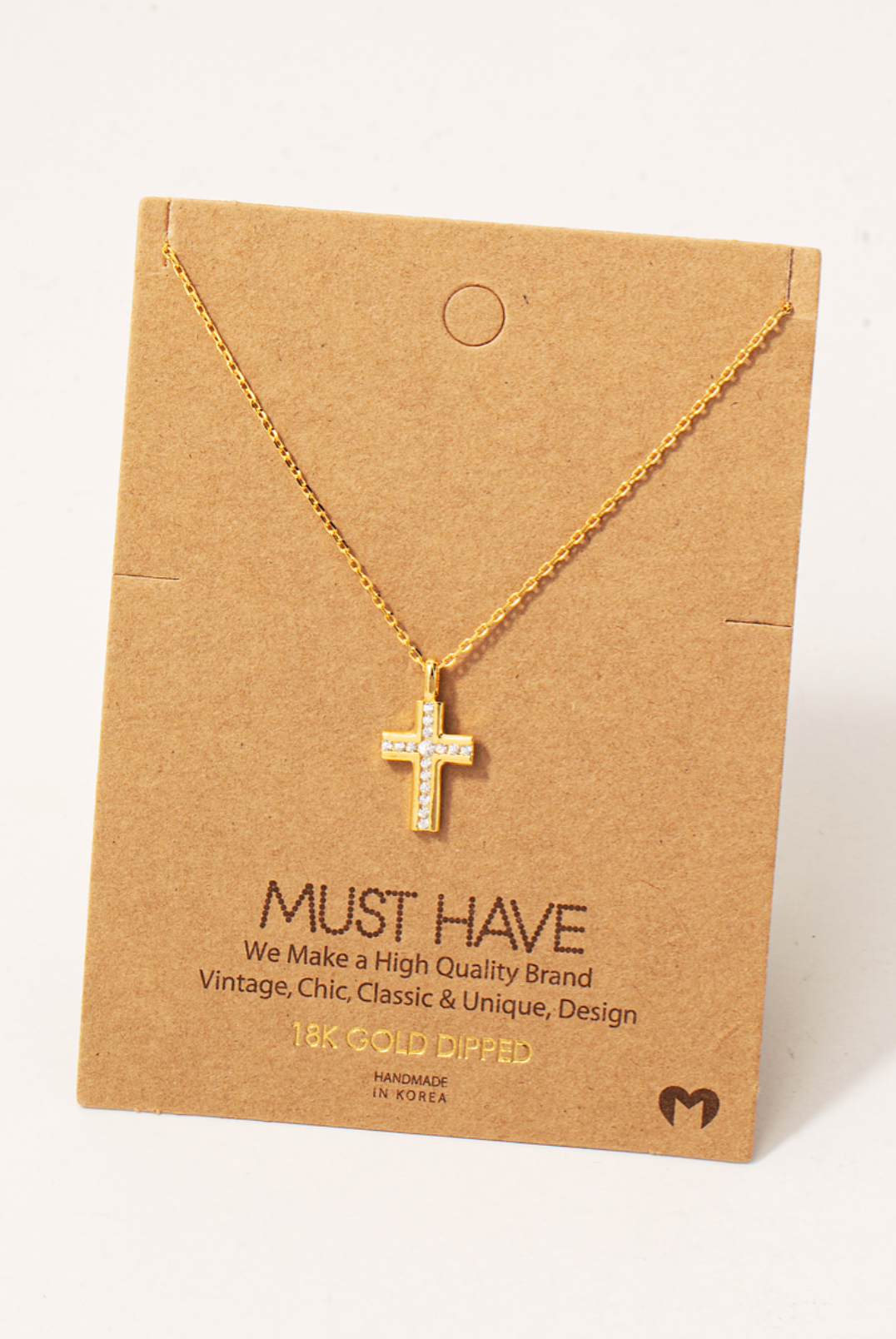 Rhinestone cross necklace.