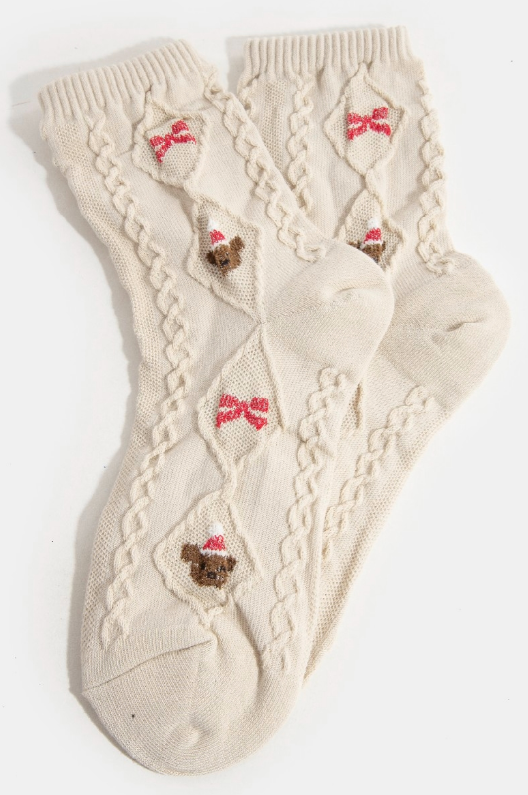 Beige embroidered knit socks with reindeer and bow holiday design