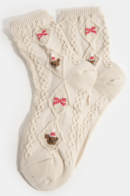 Beige embroidered knit socks with reindeer and bow holiday design