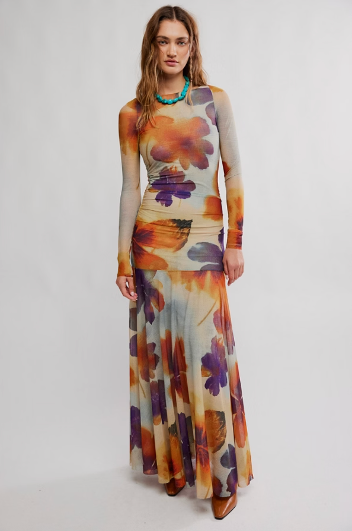 Model wearing floral mesh Sunnei Mesh Maxi Dress with ruched waist and long sleeves