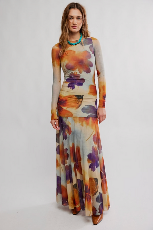 Model wearing floral mesh Sunnei Mesh Maxi Dress with ruched waist and long sleeves