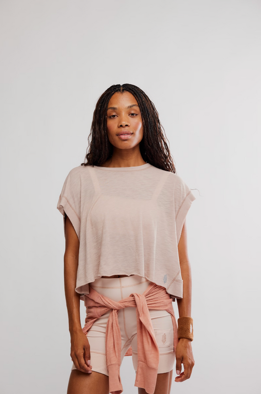 Model wearing beige My Time Tee with wide neckline and cutout back