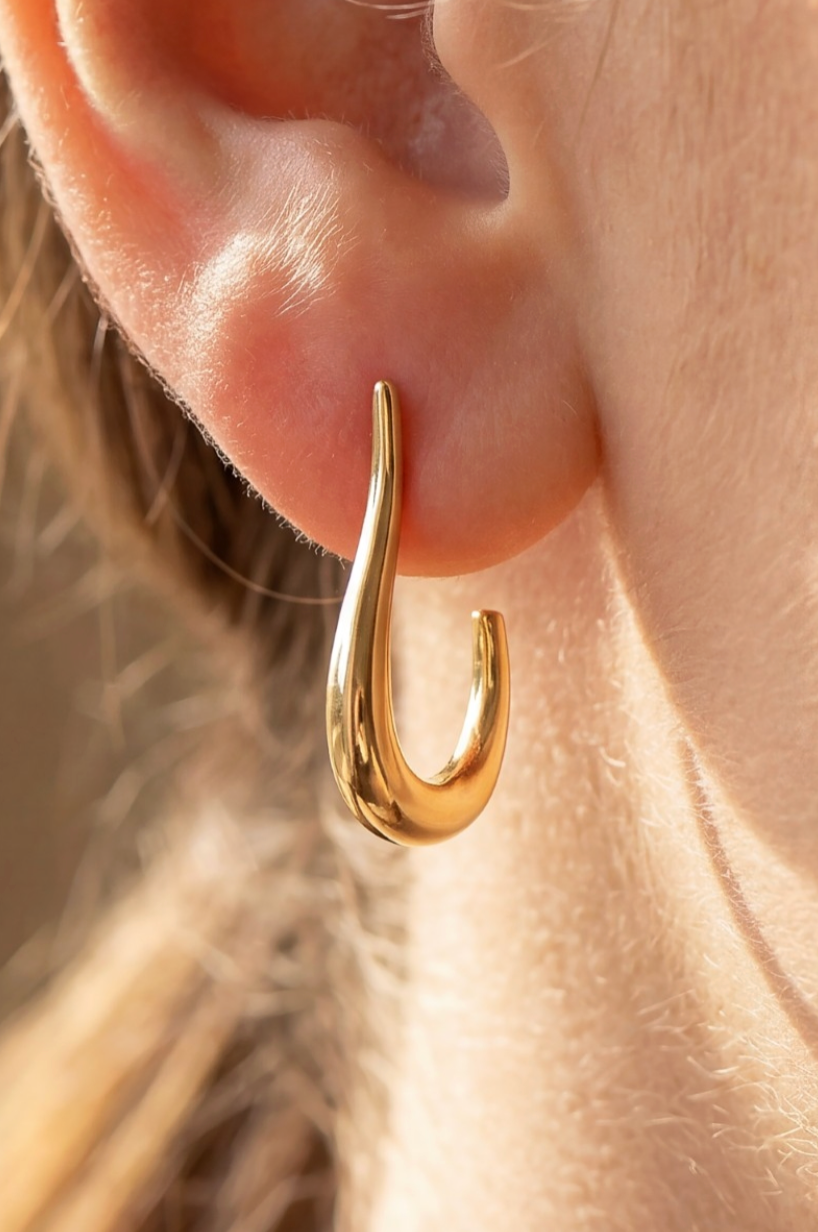 gold dipped sculptural J shape hoop earrings