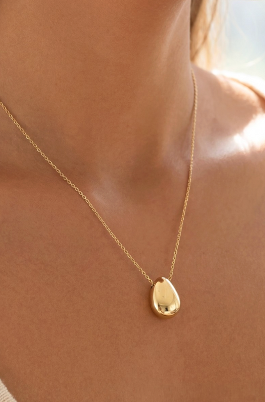 gold dipped teardrop pendant necklace on delicate chain