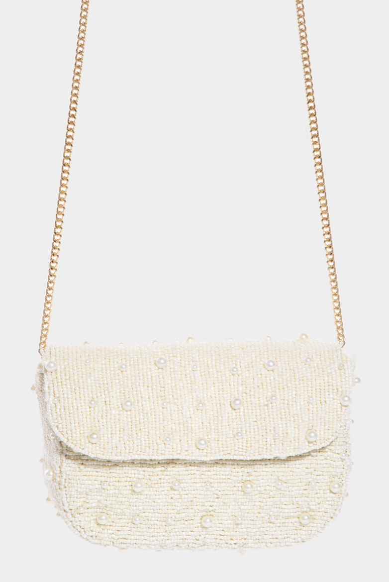 Beige beaded handbag with a chain strap on a white background