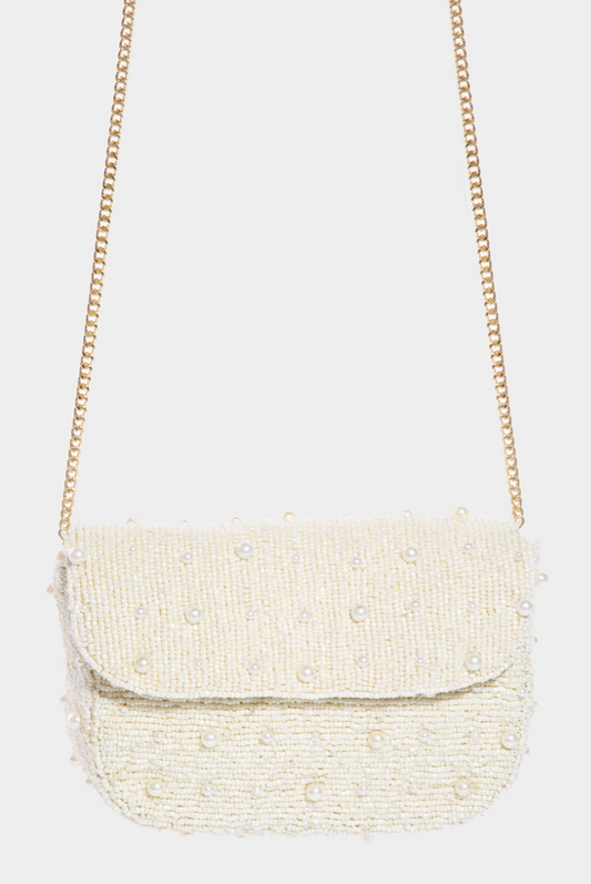 Beige beaded handbag with a chain strap on a white background