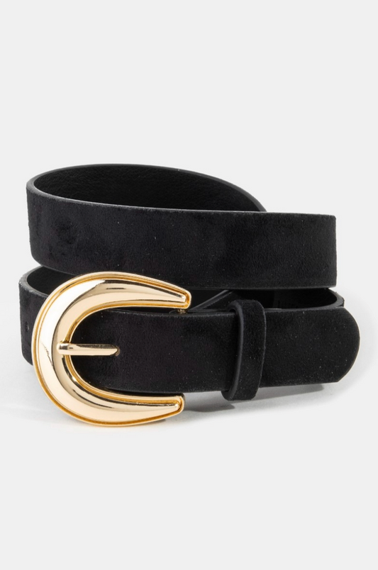 Black belt with a gold buckle on a white background