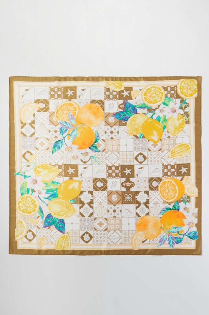 Neck scarf with lemon pattern on a white background