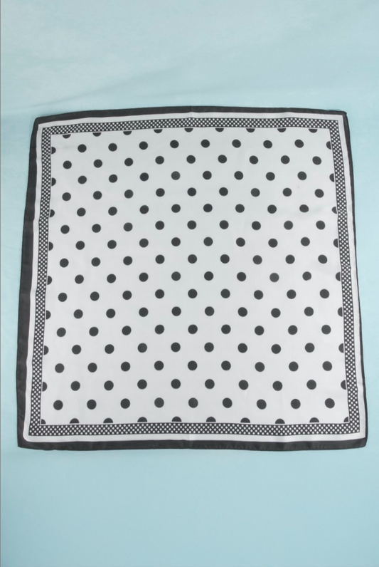 White satin square scarf with black polka dots and a coordinating dotted border.