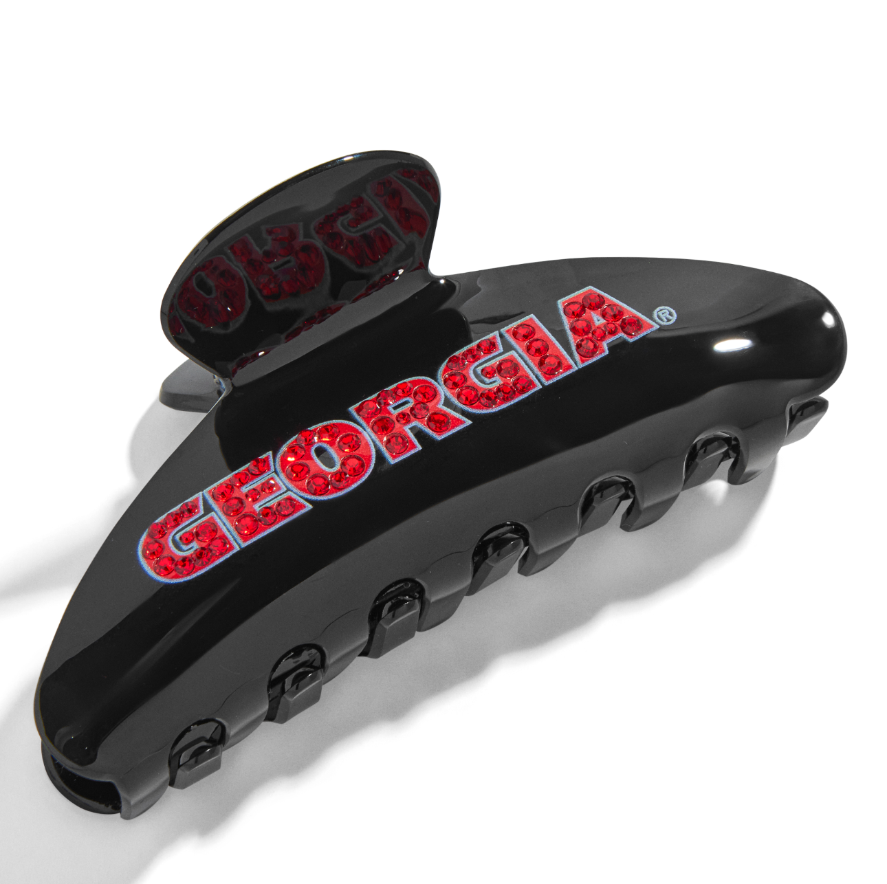 Black University of Georgia hair claw clip with red rhinestone GEORGIA lettering.