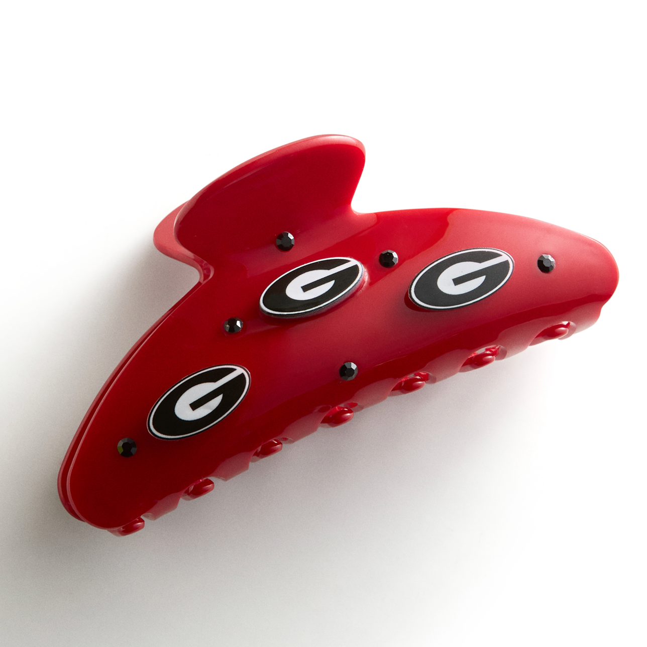 Red University of Georgia logo hair claw clip with multiple Georgia "G" logos and black rhinestone accents.