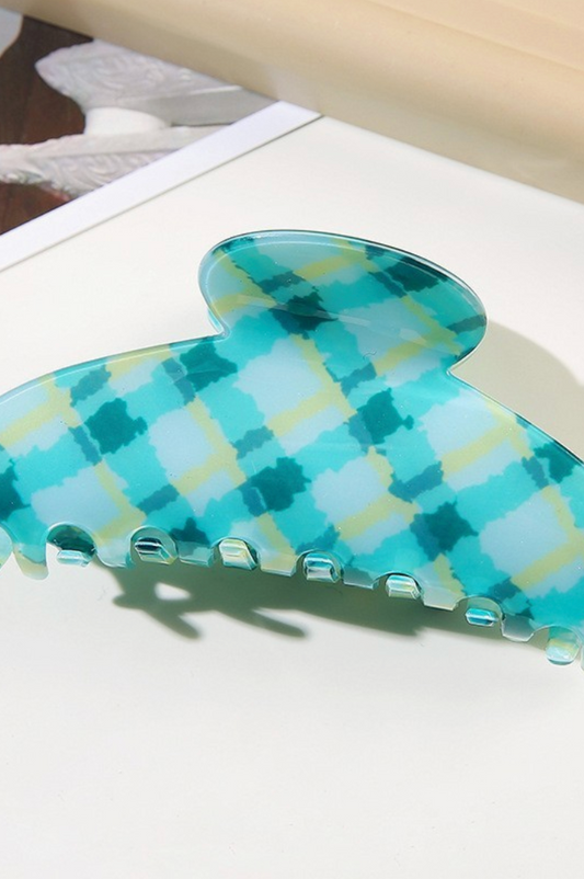 Large mint green checker patterned oval hair claw clip with oversized design for secure all-day hold.