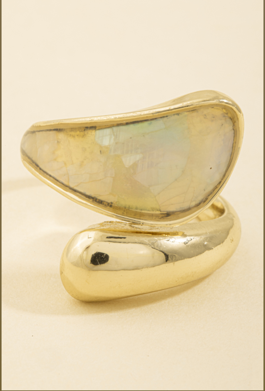 Gold wrap ring with iridescent shell mosaic inlay and asymmetrical crossover design.