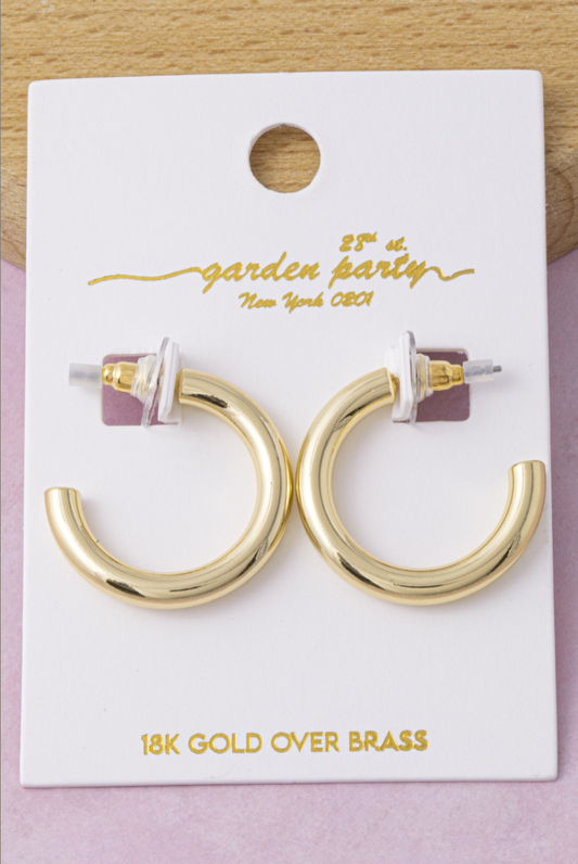 18K gold-dipped chunky mini hoop earrings with a polished rounded tube design.