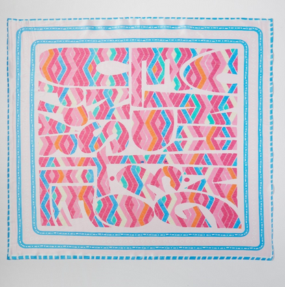 Pink square scarf featuring a colorful abstract tribal-inspired print with turquoise, orange, and white accents.