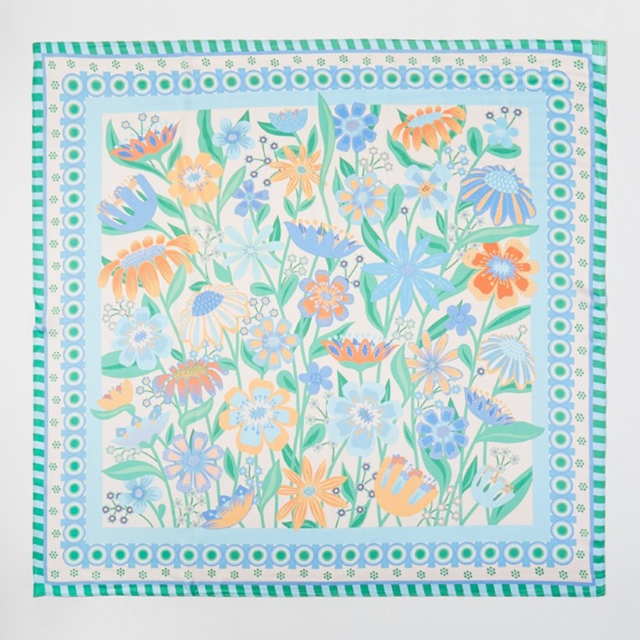 Square floral bandana scarf featuring blue, mint, peach, and green flowers with a decorative green and blue border.