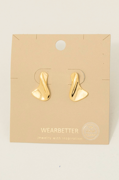 Gold dipped sculptural twisted drop earrings with a polished organic finish.