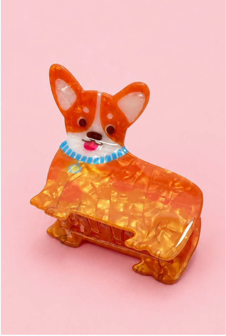 Every Step Dog Claw Clip Light featuring an orange and cream corgi-inspired dog design with blue collar.