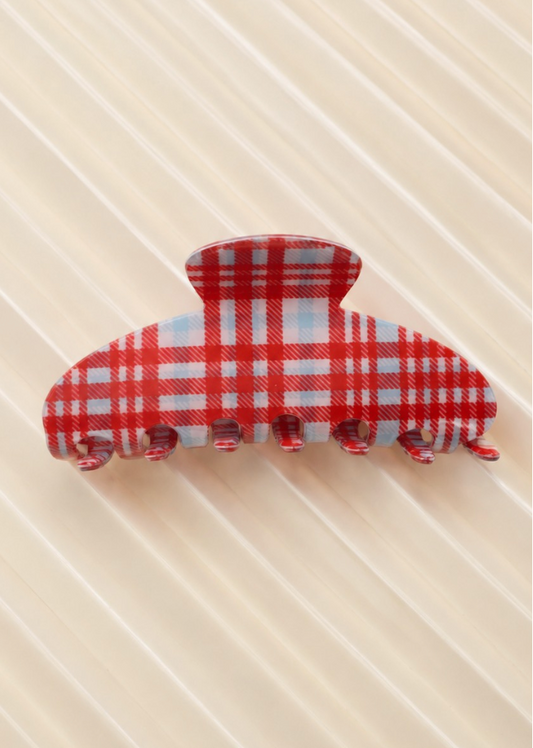 Kelsey Plaid Claw Clip Red featuring a rounded red plaid hair claw with interlocking teeth.