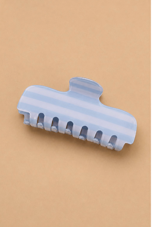 Father Figure Striped Claw Clip Light Blue featuring a glossy light blue and white striped acetate hair claw with interlocking teeth.