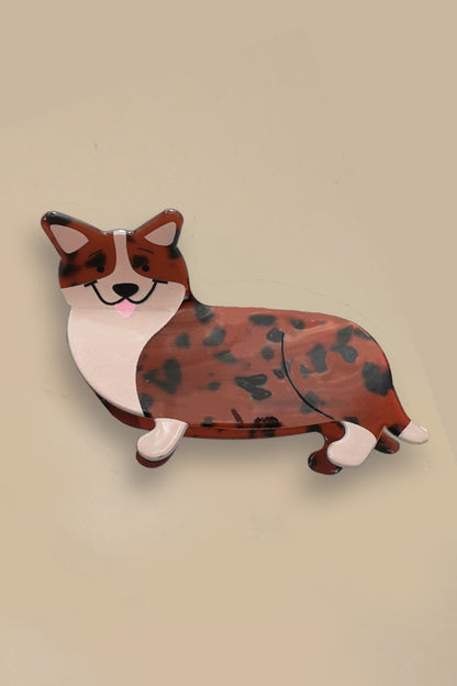 Wooden corgi figurine on a beige background