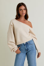Load image into Gallery viewer, Model wearing Cloudline Asymmetric Sweater with off-shoulder neckline and balloon sleeves