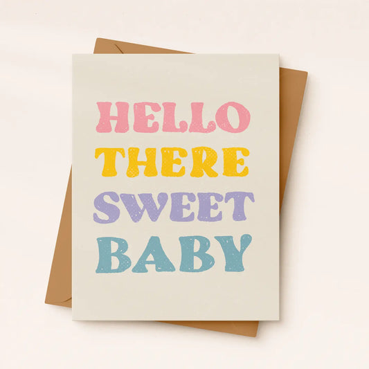 Greeting card with 'Hello there sweet baby' text in pastel colors on a beige background