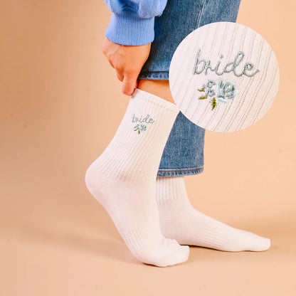 White crew socks with “bride” embroidery and blue floral detail for wedding day wear