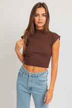 Load image into Gallery viewer, Model wearing brown high-neck cropped knit sweater top styled with light-wash jeans.