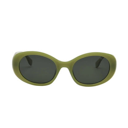 Green sunglasses with dark lenses on a white background