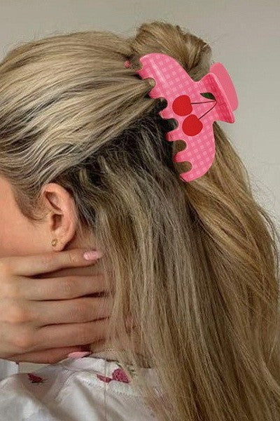 pink gingham cherry hair claw clip on blonde hair